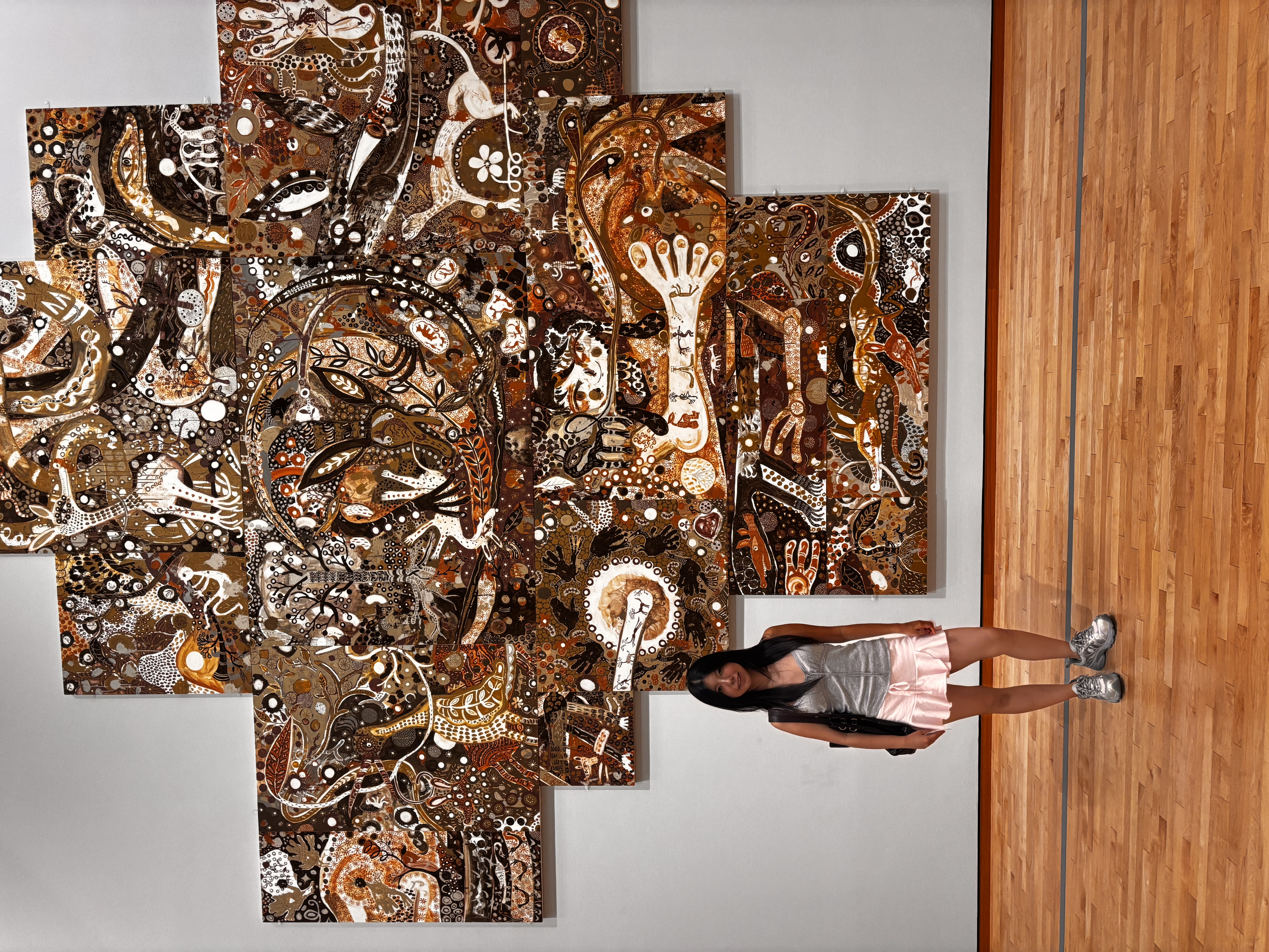 Chaebin standing beside a painting